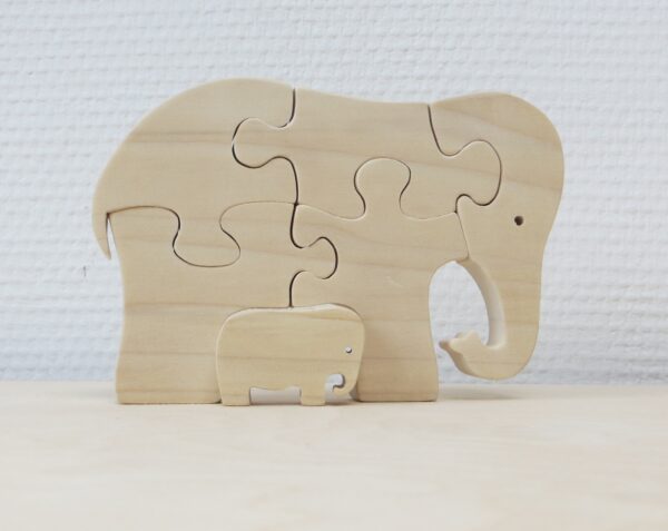 Puzzelolifant met jong naast elkaar